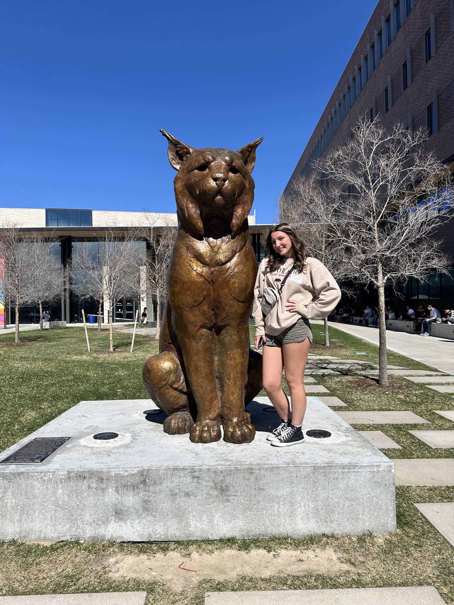 Gracie with the Lynx Statue at CU Denver